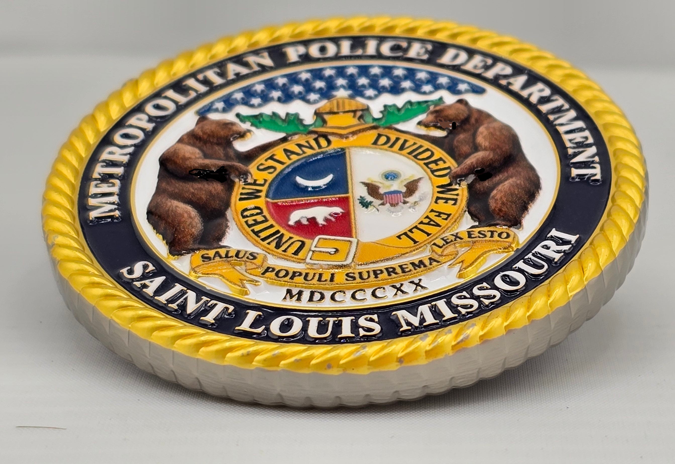 Metropolitan Police Department emblem of Saint Louis, Missouri on a gray background
